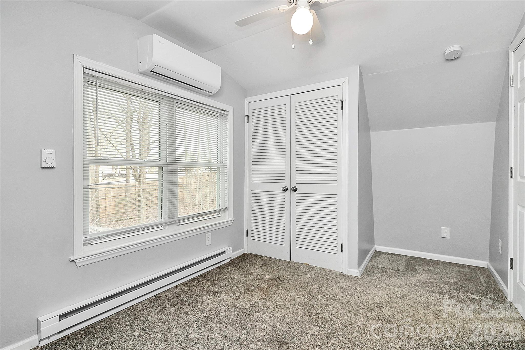 8591 Bartlett Road Mint Hill, NC 28227 - Photo 24 of 45 an empty room with windows