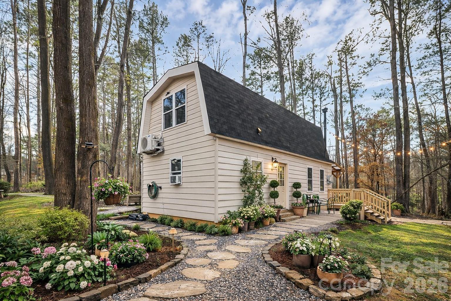 8591 Bartlett Road Mint Hill, NC 28227 - Photo 34 of 45 a front view of a house with garden