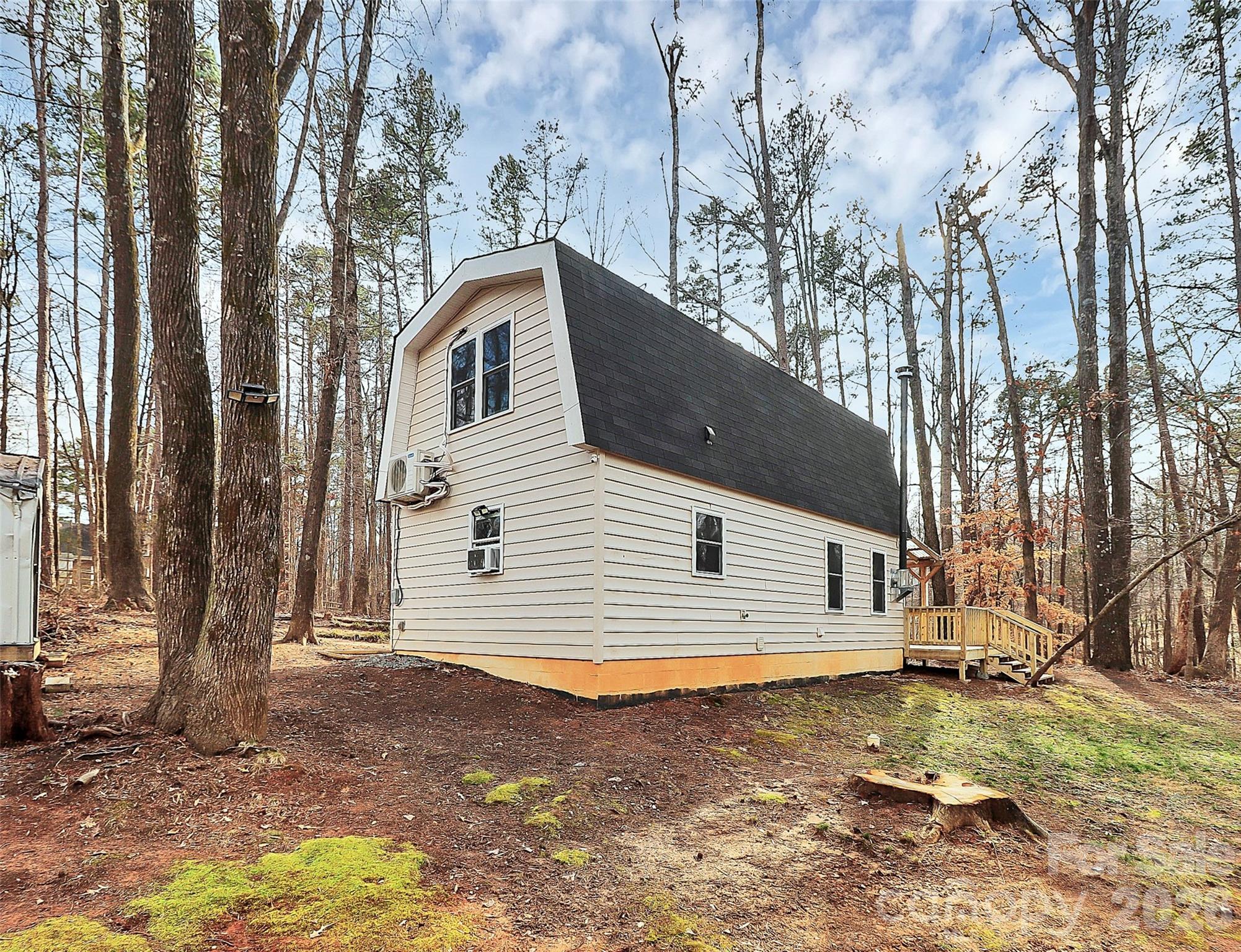 8591 Bartlett Road Mint Hill, NC 28227 - Photo 35 of 45 a view of a house with a yard
