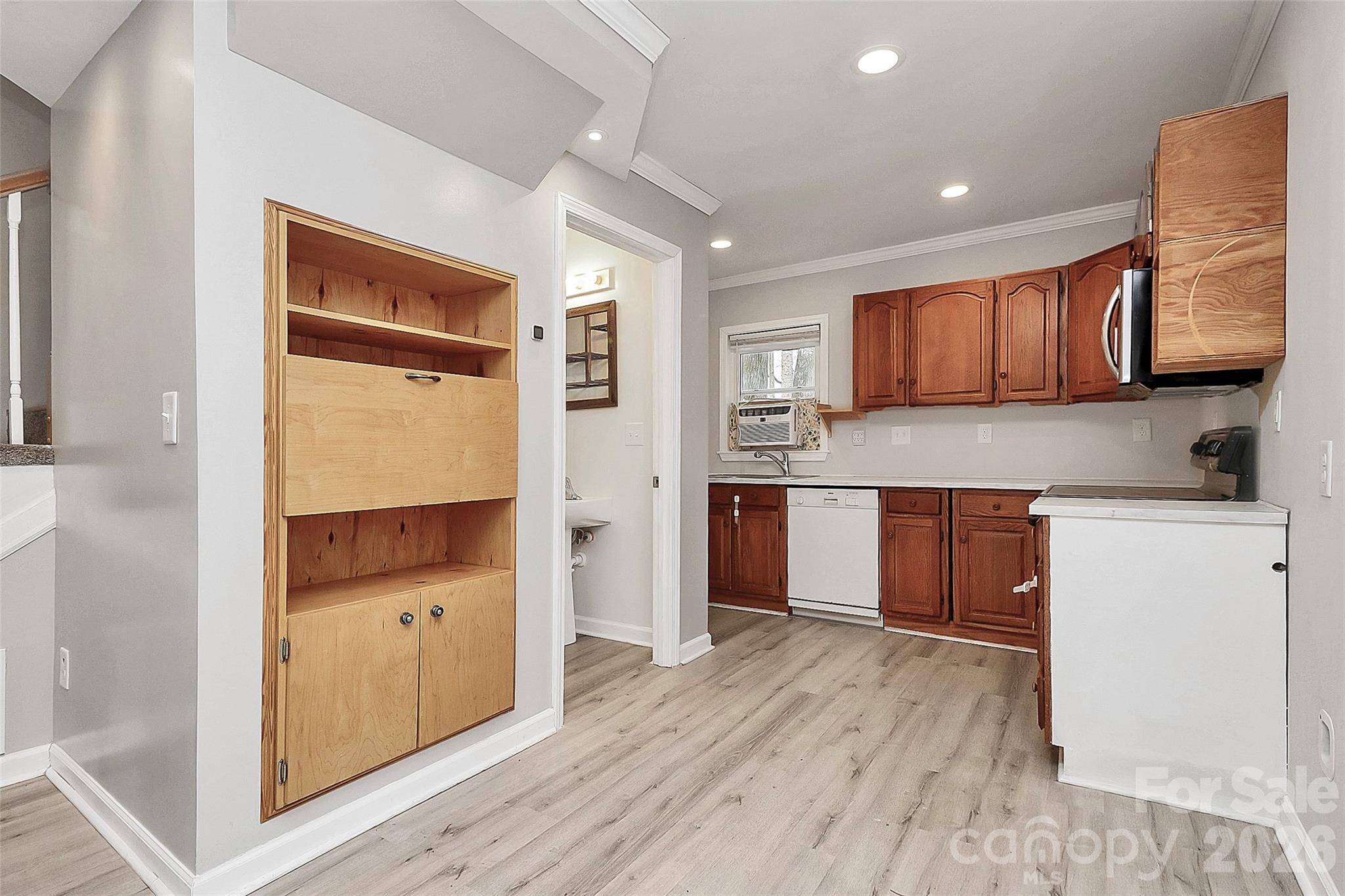 8591 Bartlett Road Mint Hill, NC 28227 - Photo 9 of 45 a kitchen with stainless steel appliances granite countertop a refrigerator and a stove top oven