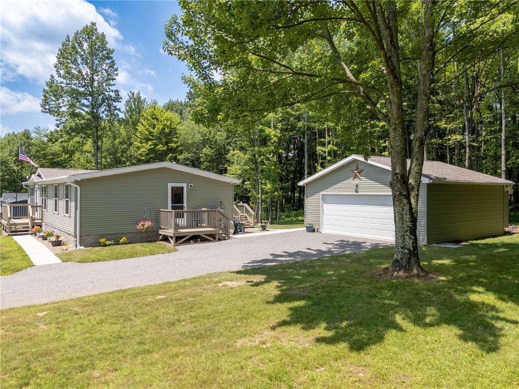73 South Summit Road, Unit 510 Greenville, PA 16125 - Photo 31 of 33 a view of a house with backyard and sitting area