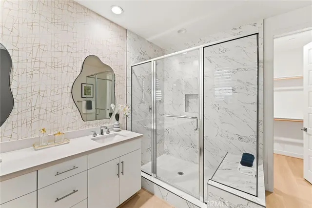 a bathroom with a sink and a mirror