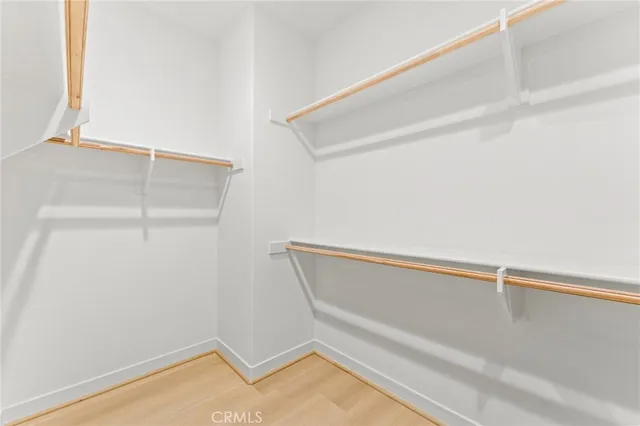 a bathroom with a sink double vanity granite tub and shower