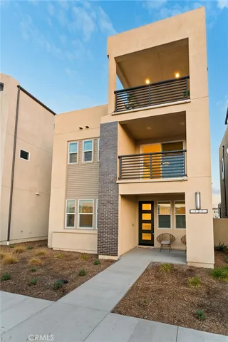 an aerial view of a house with a swimming pool