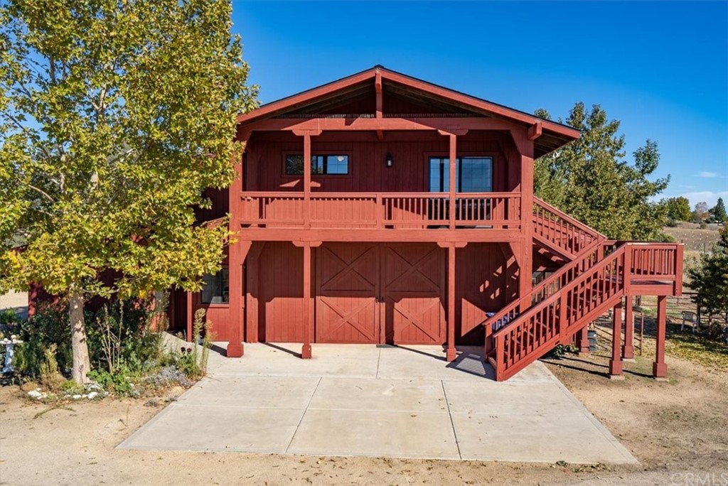 8700 Bee Tree Road Paso Robles, CA 93446 - Photo 11 of 74 a front view of a house with balcony