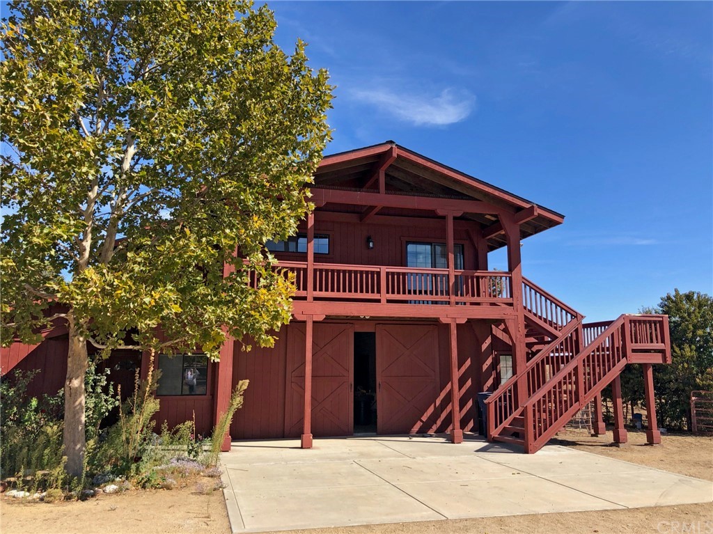 8700 Bee Tree Road Paso Robles, CA 93446 - Photo 19 of 74 a front view of a house with a yard