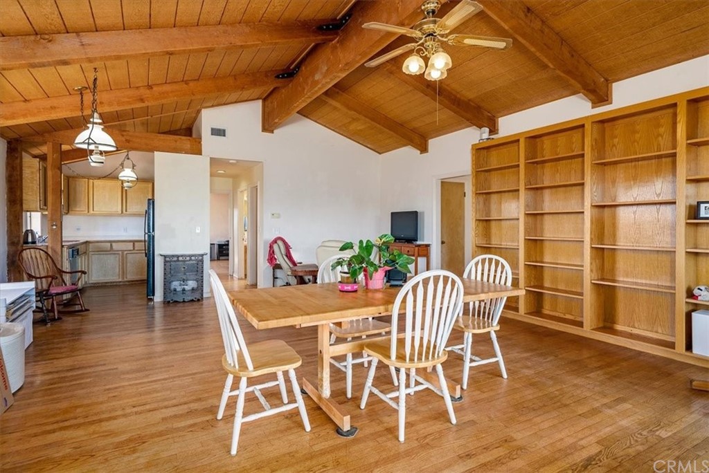 8700 Bee Tree Road Paso Robles, CA 93446 - Photo 25 of 74 a dining room with furniture and wooden floor