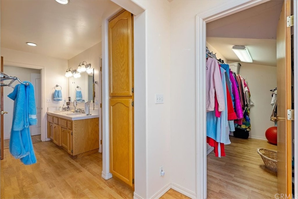 8700 Bee Tree Road Paso Robles, CA 93446 - Photo 33 of 74 a view of a bathroom with sink and mirror