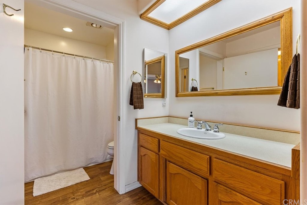8700 Bee Tree Road Paso Robles, CA 93446 - Photo 41 of 74 a bathroom with a sink and a mirror