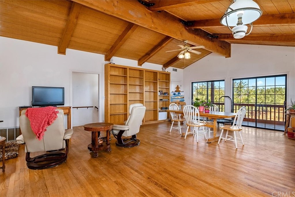 8700 Bee Tree Road Paso Robles, CA 93446 - Photo 6 of 74 a view of a dining room with furniture window and wooden floor