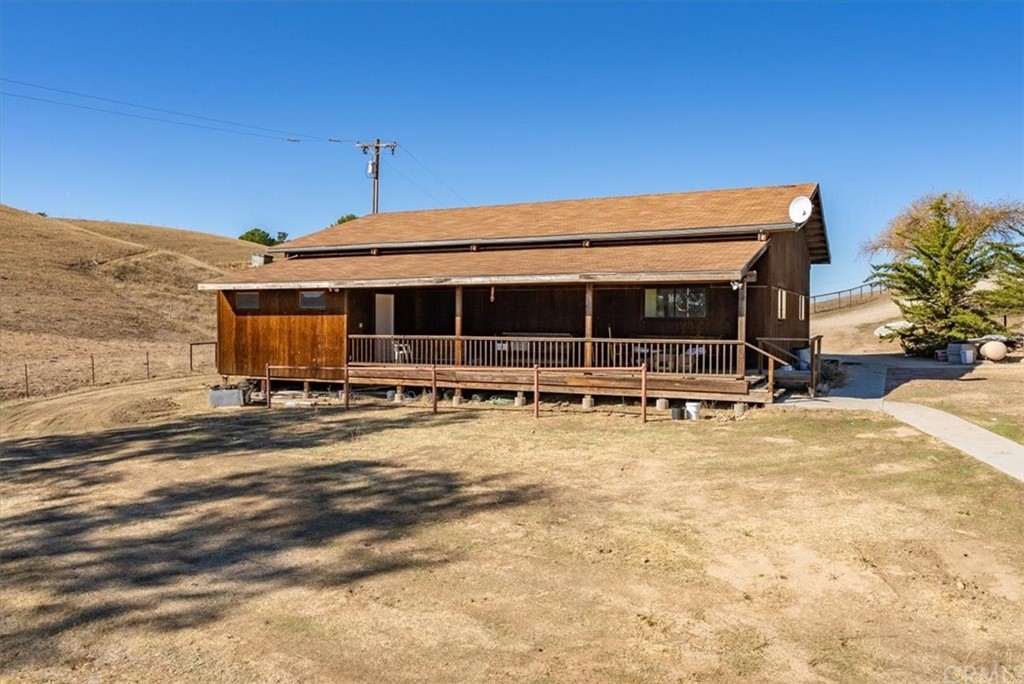 8700 Bee Tree Road Paso Robles, CA 93446 - Photo 64 of 74 a view of a house with a backyard