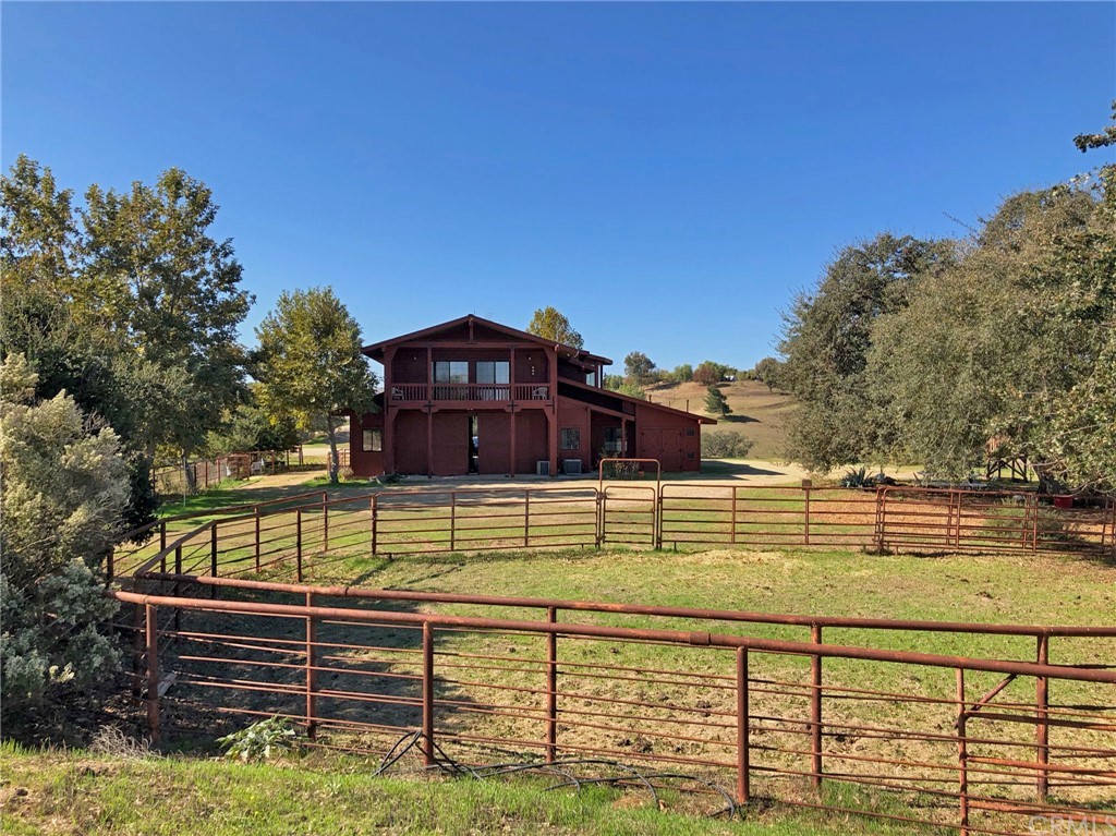 8700 Bee Tree Road Paso Robles, CA 93446 - Photo 7 of 74 a view of a swimming pool with a house