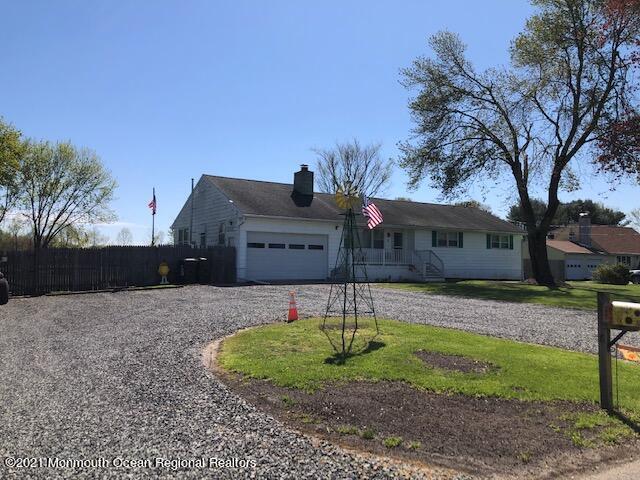 8 Inman Road New Egypt, NJ 08533 - Photo 3 of 18 a front view of a house with a yard