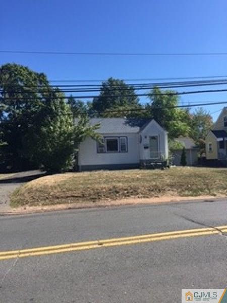 128 Magnolia Road Iselin, NJ 08830 - Photo 1 of 9 a view of a house with a outdoor space