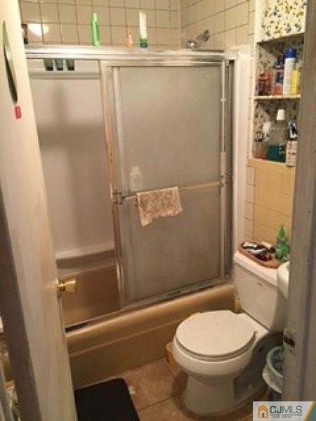 128 Magnolia Road Iselin, NJ 08830 - Photo 4 of 9 a bathroom with a toilet and a shower
