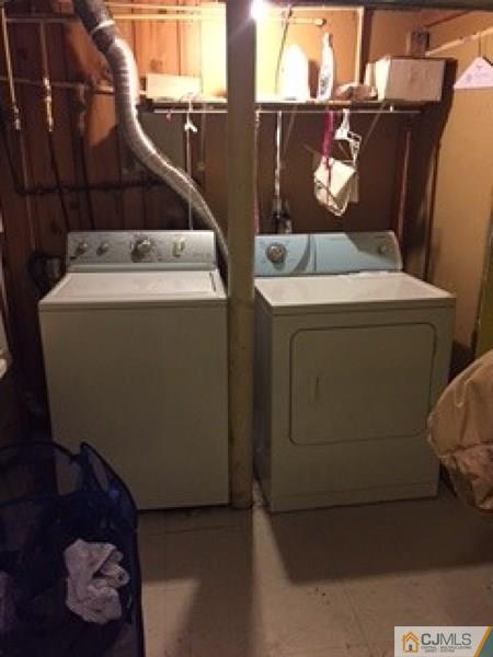 128 Magnolia Road Iselin, NJ 08830 - Photo 8 of 9 a utility room with dryer and washer