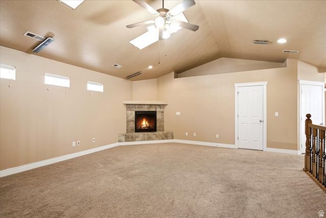 1089 West 2325th Street North Layton, UT 84041 - Photo 16 of 40 Spacious room featuring vaulted ceilings, a ceiling fan, and recessed lighting