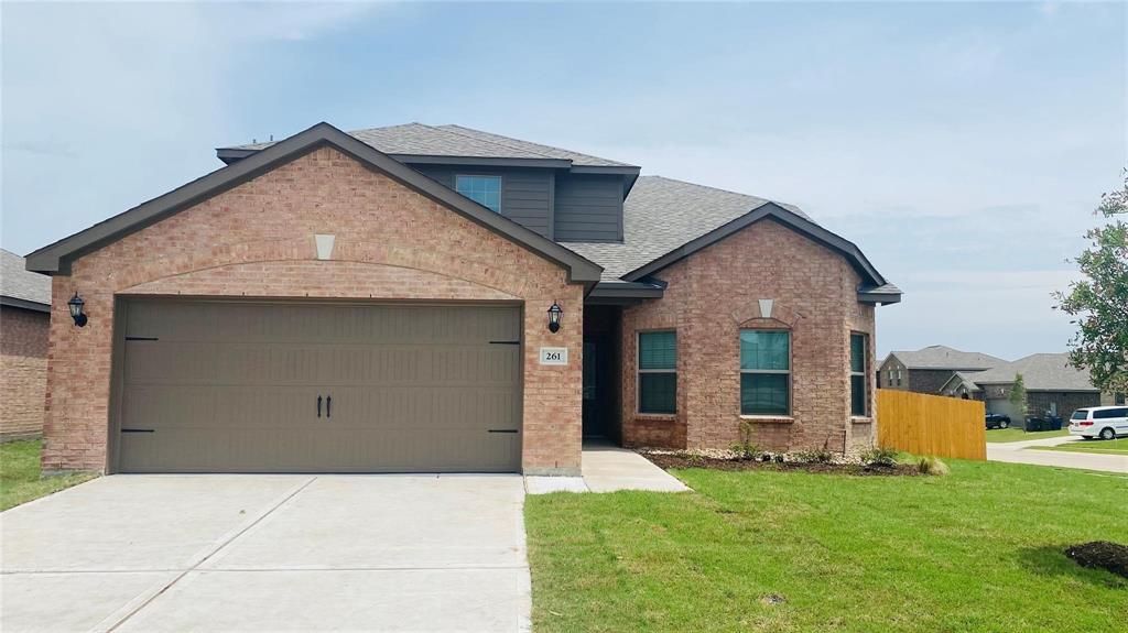261 Moonstone Way Princeton, TX 75407 - Photo 1 of 9 a front view of house with yard