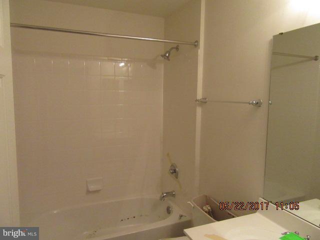 9305 Summit View Way Perry Hall, MD 21128 - Photo 11 of 12 a bathroom with a bathtub and a shower