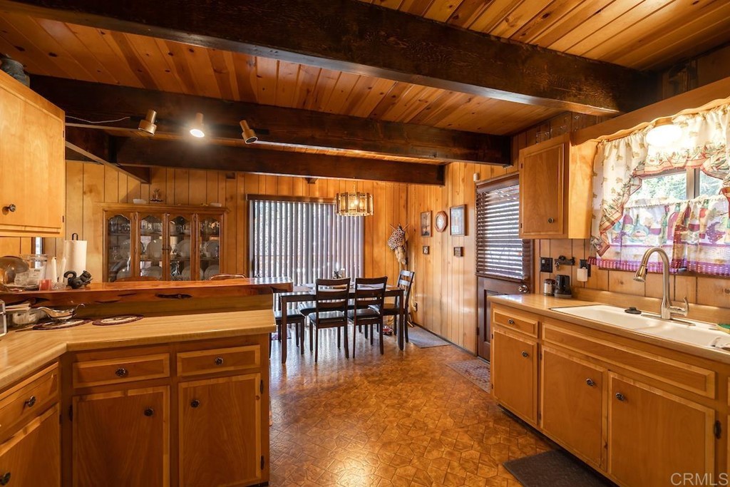 42535 Avalon Road Big Bear Lake, CA 92315 - Photo 12 of 26 a very nice looking dining room with a large window