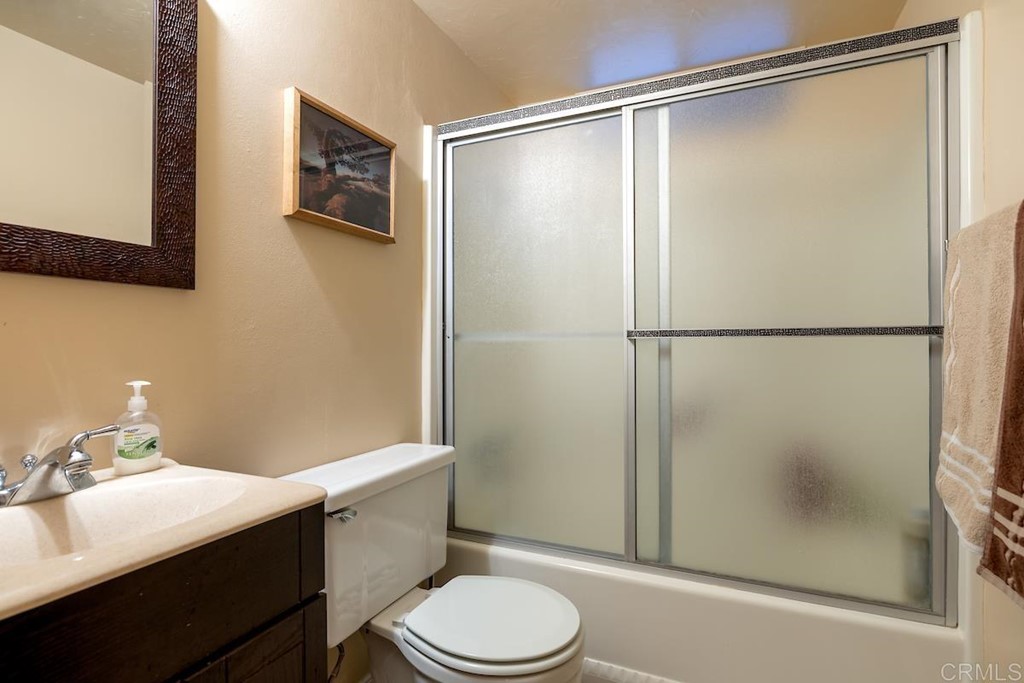 42535 Avalon Road Big Bear Lake, CA 92315 - Photo 15 of 26 a bathroom with a shower toilet and sink