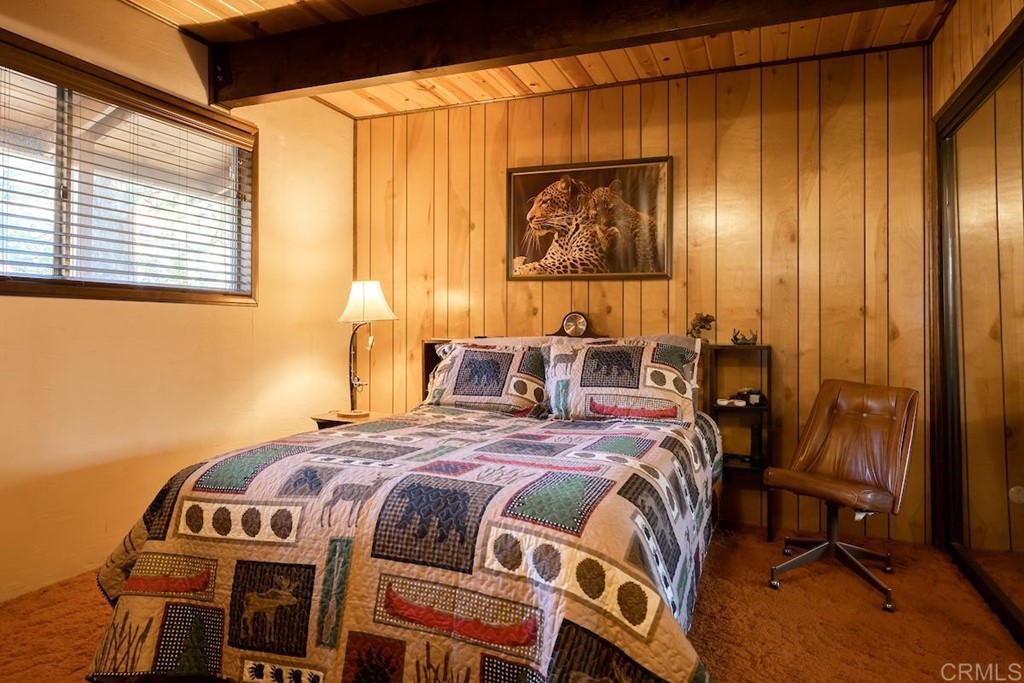 42535 Avalon Road Big Bear Lake, CA 92315 - Photo 16 of 26 a bedroom with a bed and a window