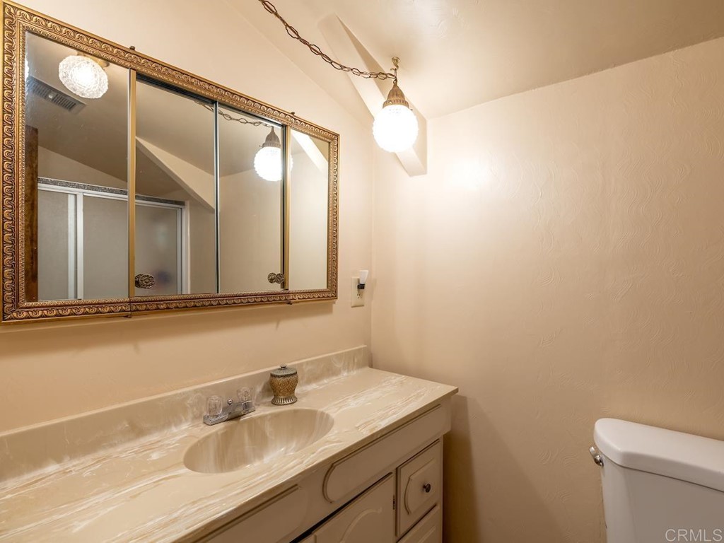 42535 Avalon Road Big Bear Lake, CA 92315 - Photo 20 of 26 a bathroom with a sink and a mirror
