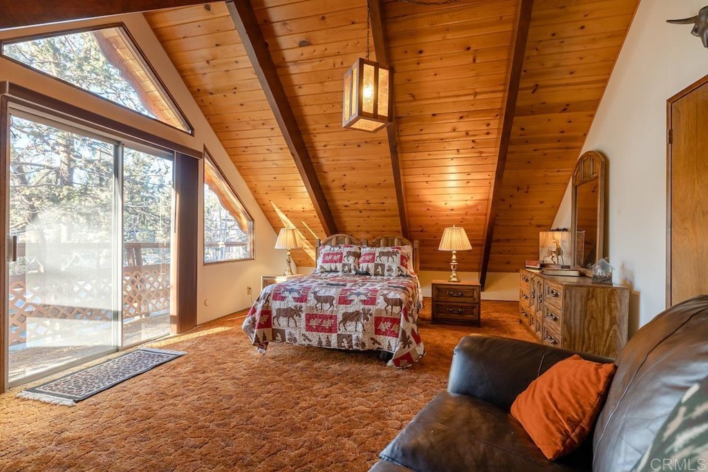 42535 Avalon Road Big Bear Lake, CA 92315 - Photo 22 of 26 a bedroom with furniture and a large window