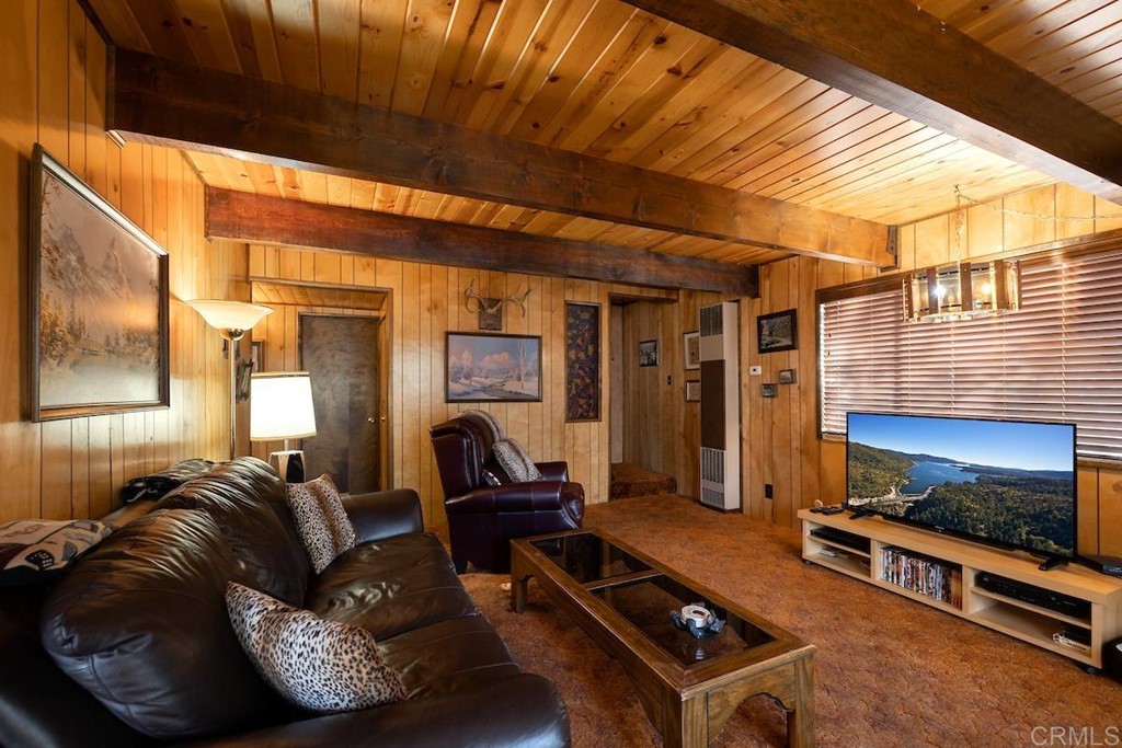 42535 Avalon Road Big Bear Lake, CA 92315 - Photo 4 of 26 a living room with furniture and a flat screen tv
