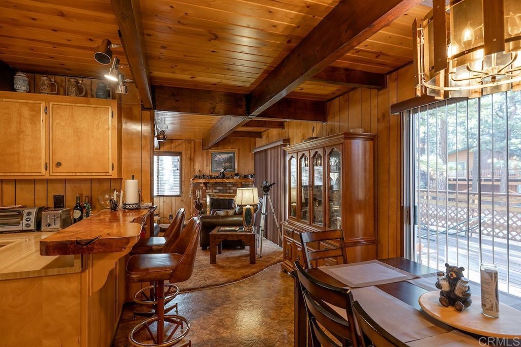 42535 Avalon Road Big Bear Lake, CA 92315 - Photo 10 of 26 a view of a patio with table and chairs