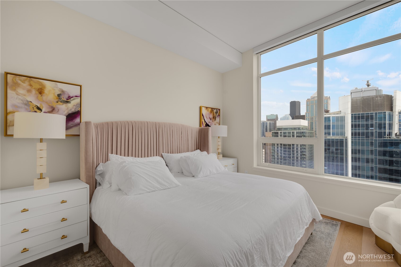 121 Stewart Street, Unit 3504 Seattle, WA 98101 - Photo 12 of 31 a bedroom with a large bed and a window