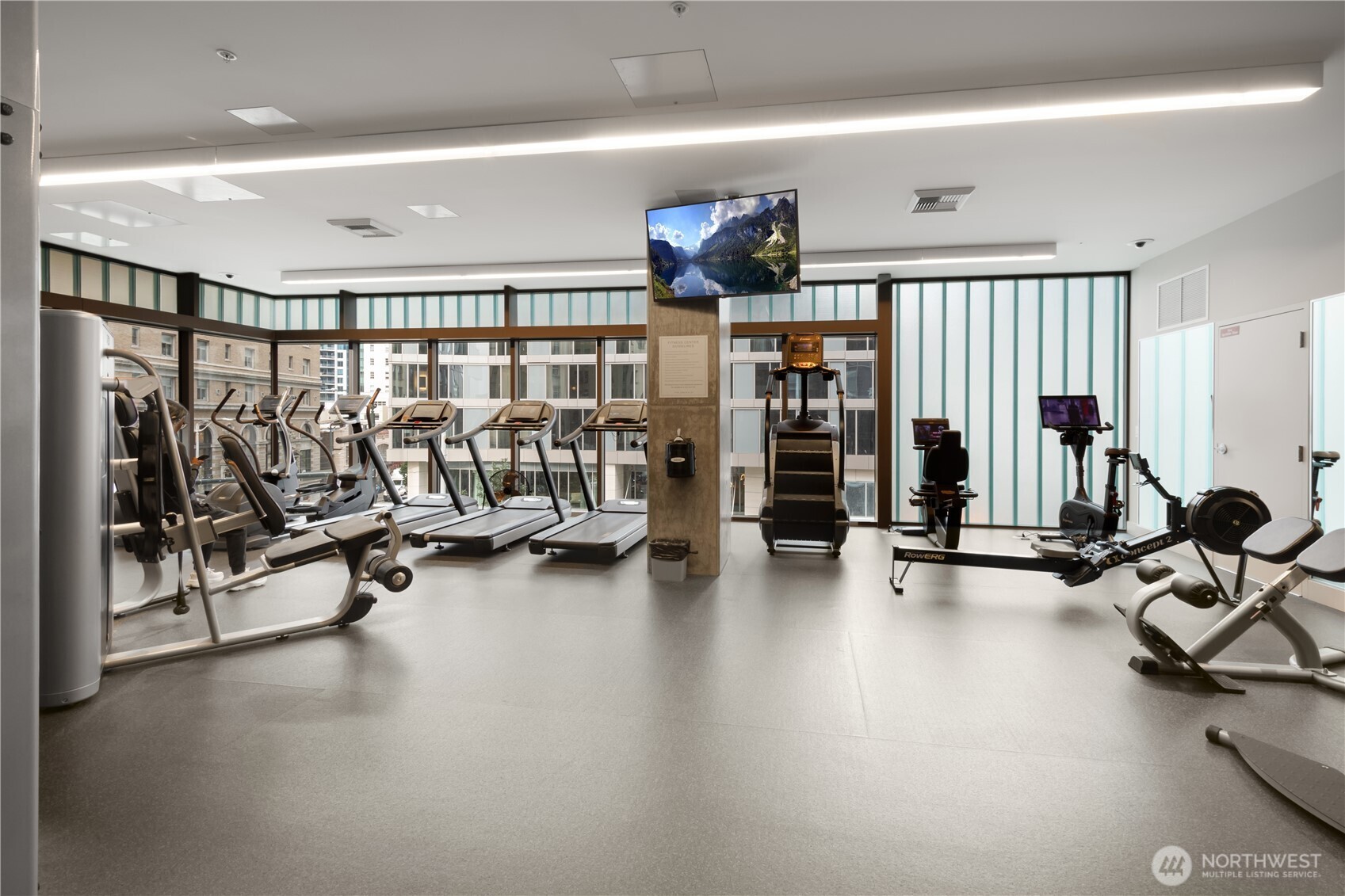 121 Stewart Street, Unit 3504 Seattle, WA 98101 - Photo 25 of 31 a view of a room with gym equipment