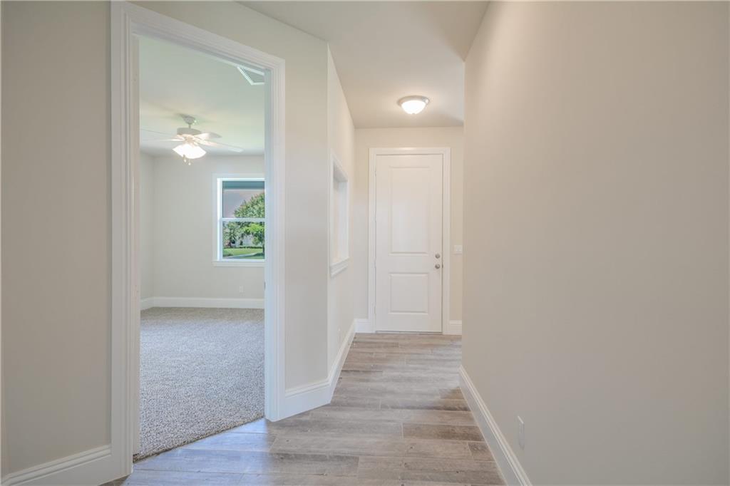 2035 Northwest Fork Road Stuart, FL 34994 - Photo 12 of 37 a view of a room with wooden floor and window