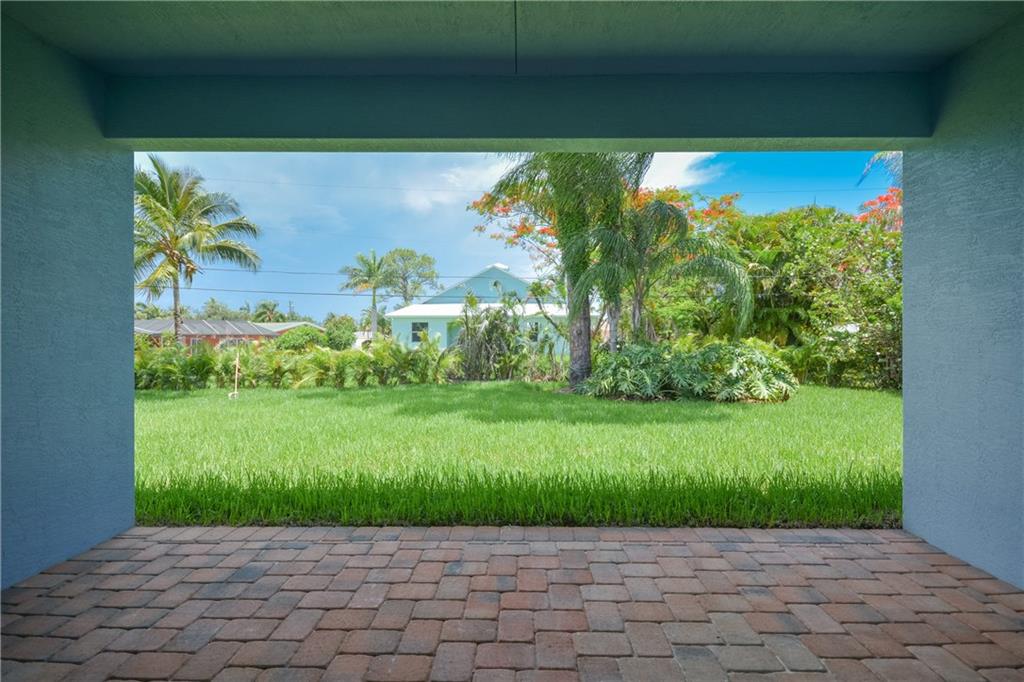 2035 Northwest Fork Road Stuart, FL 34994 - Photo 30 of 37 a view of a garden with a lot of flower plants