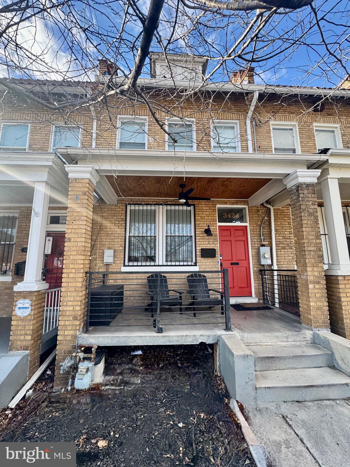 a front view of a house with swimming pool