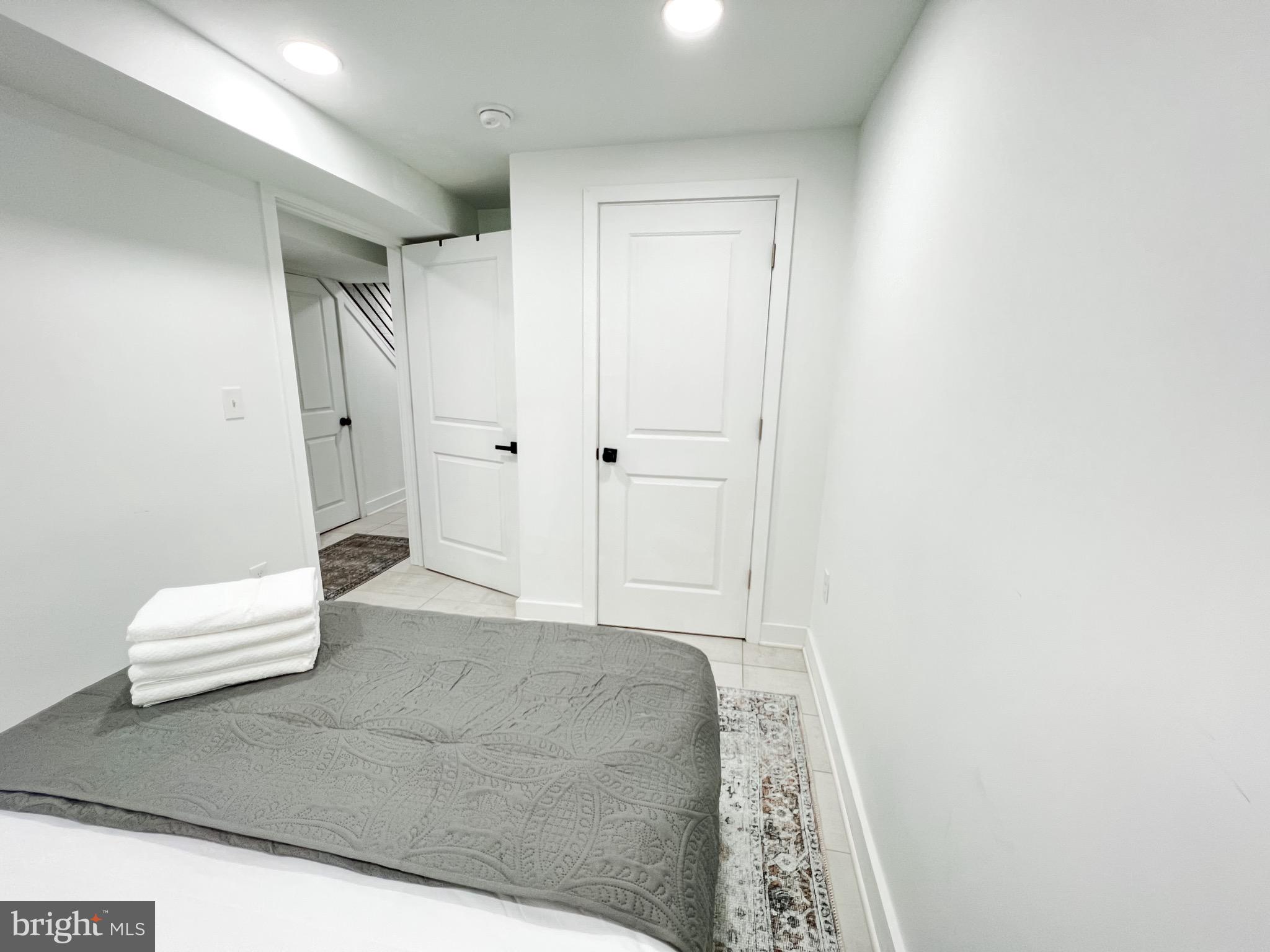 3424 9th Street Northeast Washington, DC 20017 - Photo 17 of 32 a living room with furniture and a rug