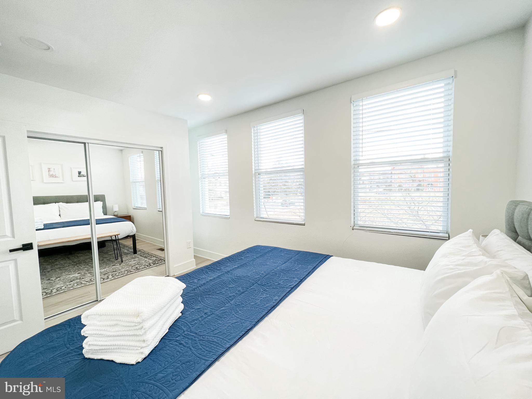 3424 9th Street Northeast Washington, DC 20017 - Photo 26 of 32 a bedroom with a bed and a window