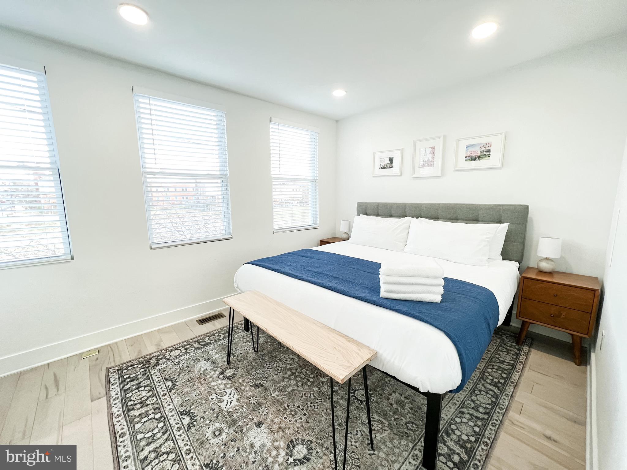 3424 9th Street Northeast Washington, DC 20017 - Photo 28 of 32 a living room with a couch and a table