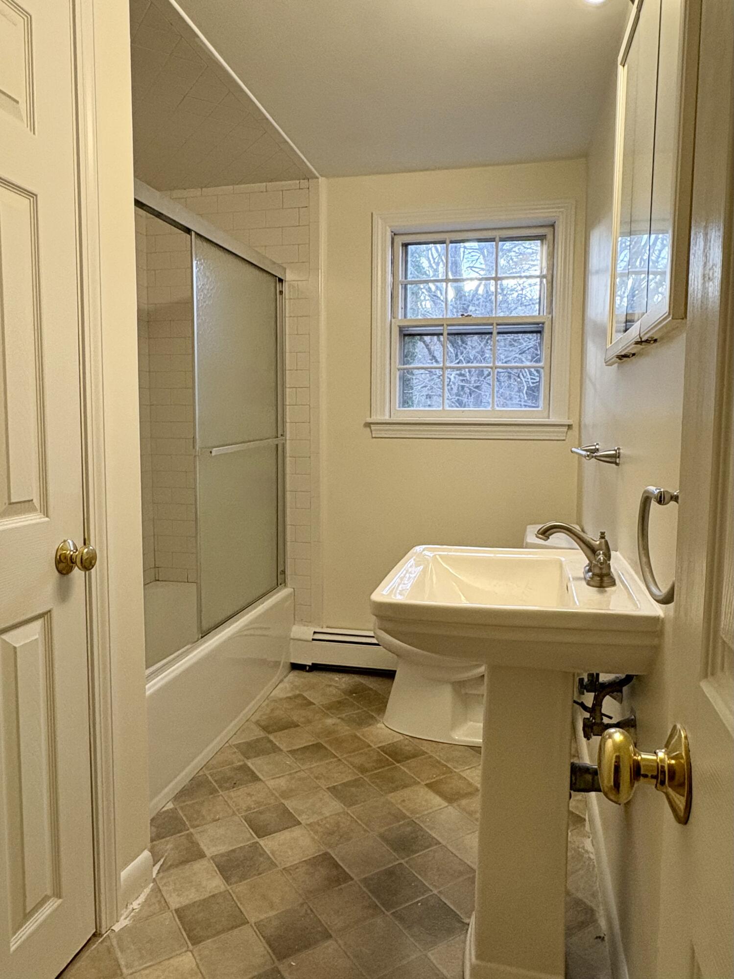 55 Chickadee Lane Centerville, MA 02632 - Photo 19 of 26 a bathroom with a sink and a window