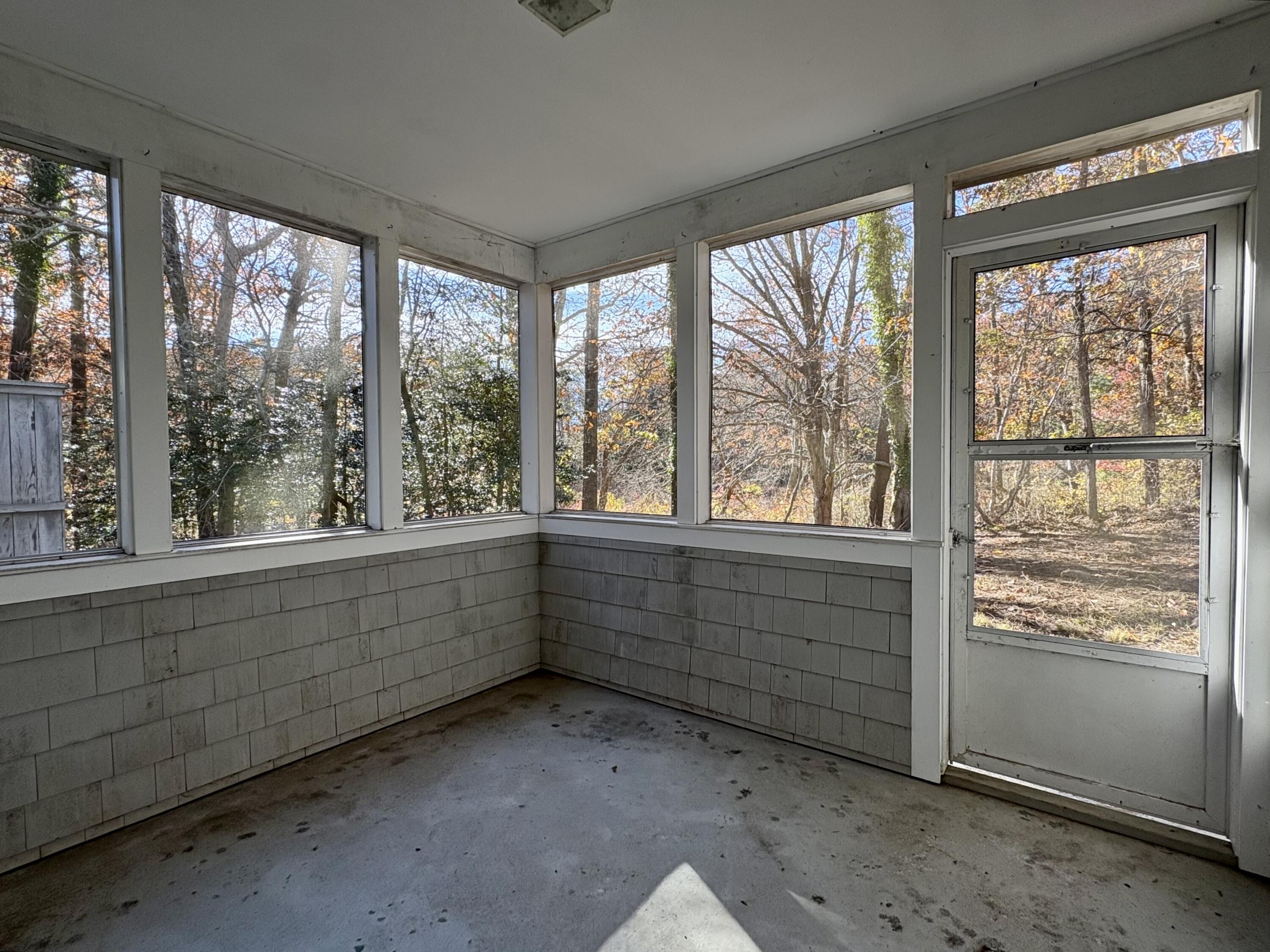 55 Chickadee Lane Centerville, MA 02632 - Photo 22 of 26 a view of an empty room with a window