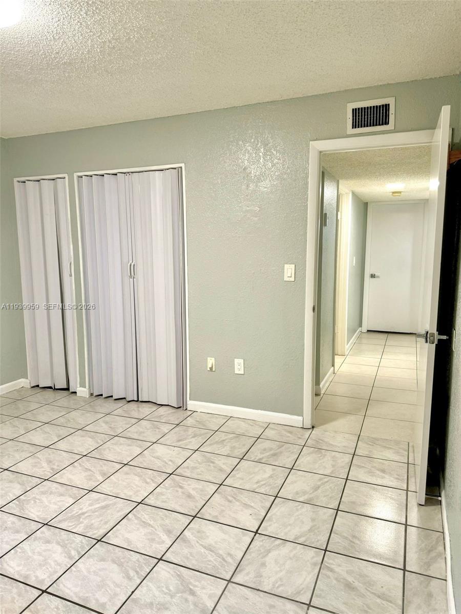 220 West 68th Street, Unit 101 Hialeah, FL 33014 - Photo 15 of 28 a view of a room with a bathroom