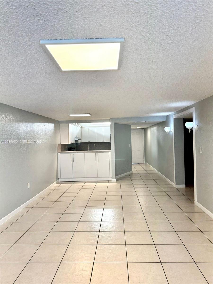 220 West 68th Street, Unit 101 Hialeah, FL 33014 - Photo 21 of 28 a view of empty room