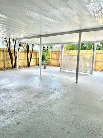 a view of a room with air conditioner and window