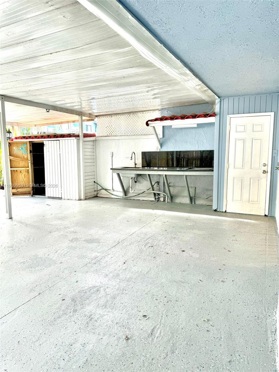 220 West 68th Street, Unit 101 Hialeah, FL 33014 - Photo 25 of 28 a view of a room with air conditioner and window