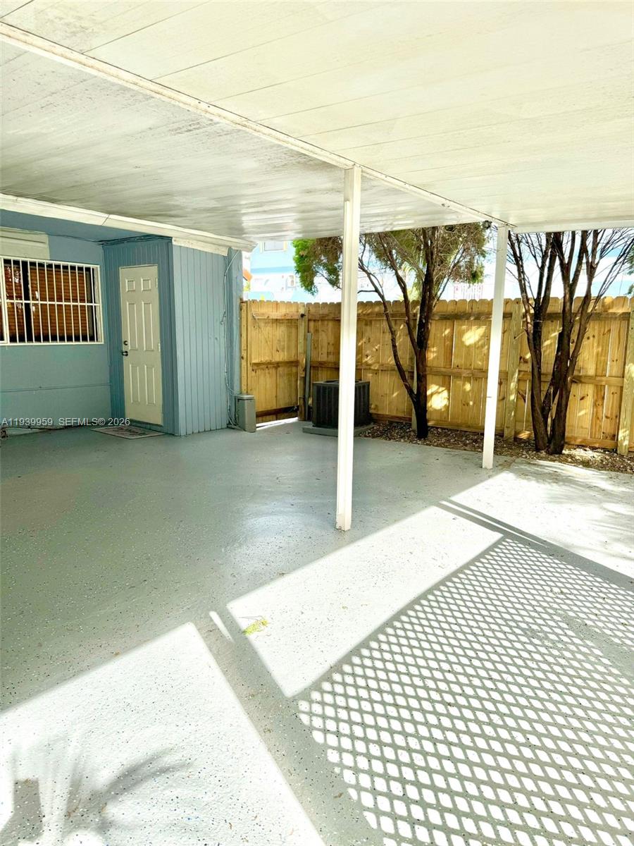 220 West 68th Street, Unit 101 Hialeah, FL 33014 - Photo 26 of 28 a view of a house with a outdoor space