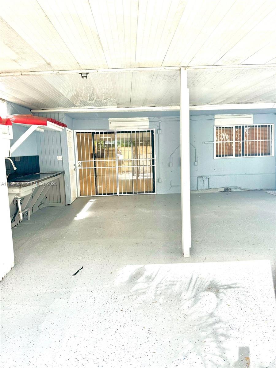 220 West 68th Street, Unit 101 Hialeah, FL 33014 - Photo 27 of 28 a view of an empty room