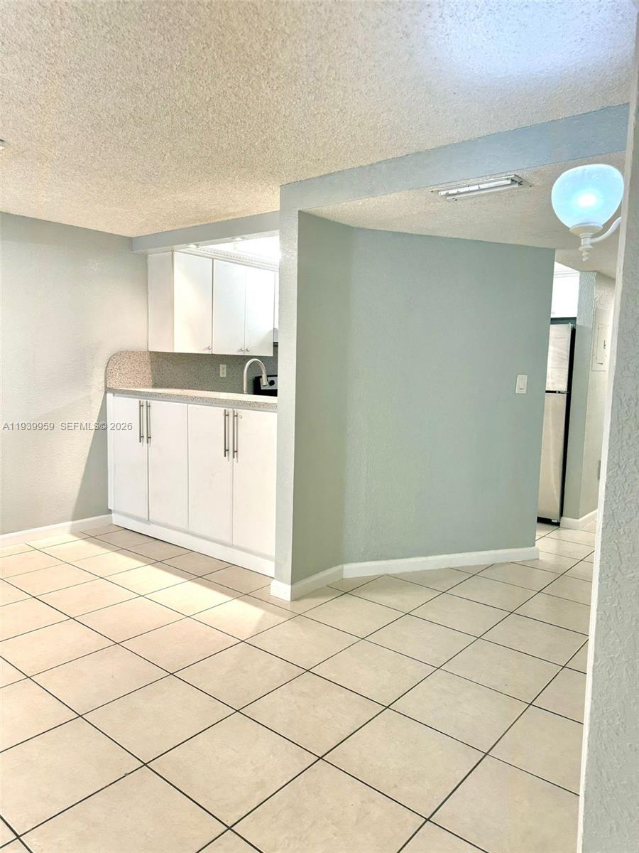 220 West 68th Street, Unit 101 Hialeah, FL 33014 - Photo 6 of 28 a view of empty room
