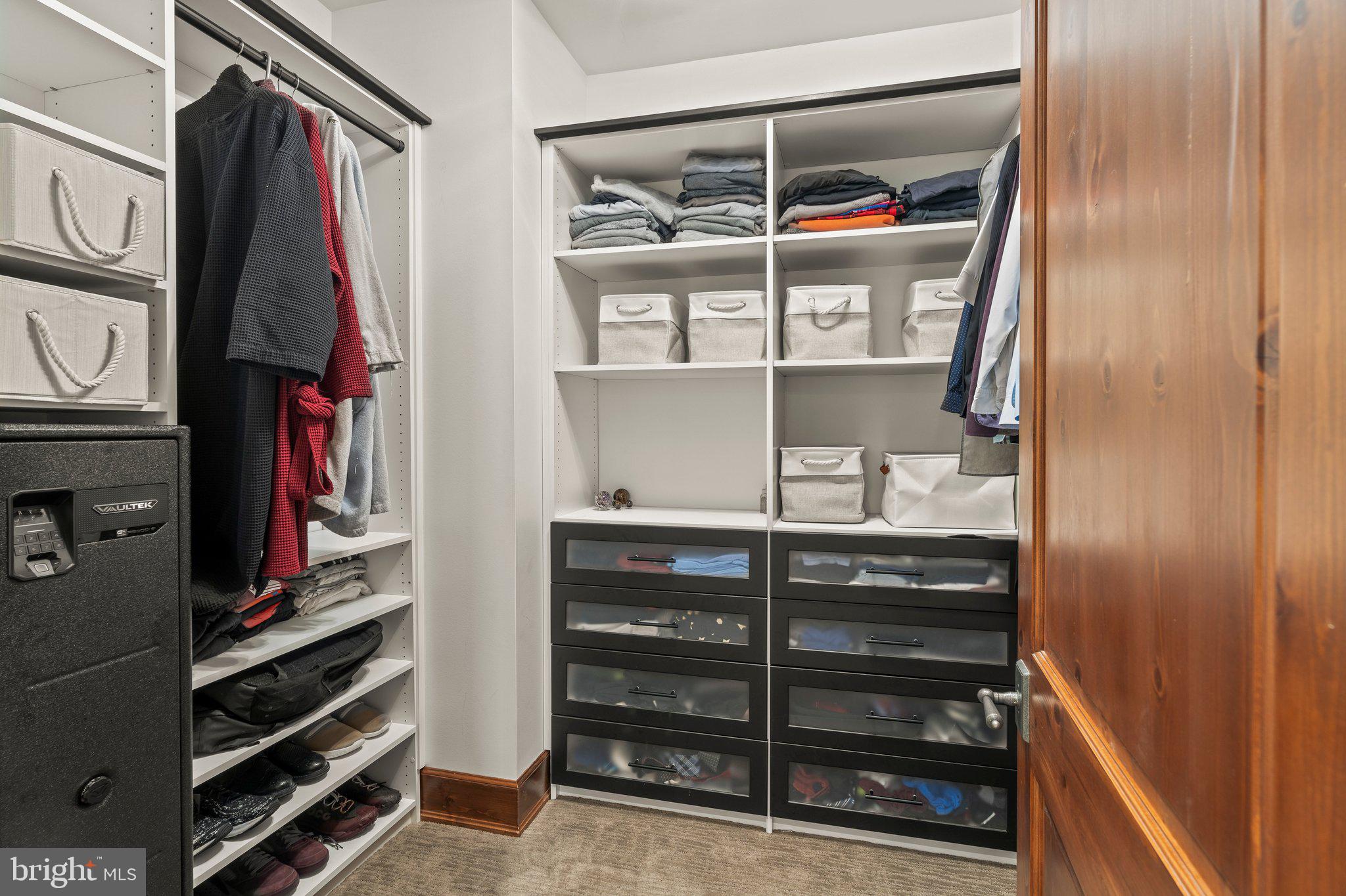 477 Heritage Sewell, NJ 08080 - Photo 31 of 64 a view of walk in closet with clothes and shoes