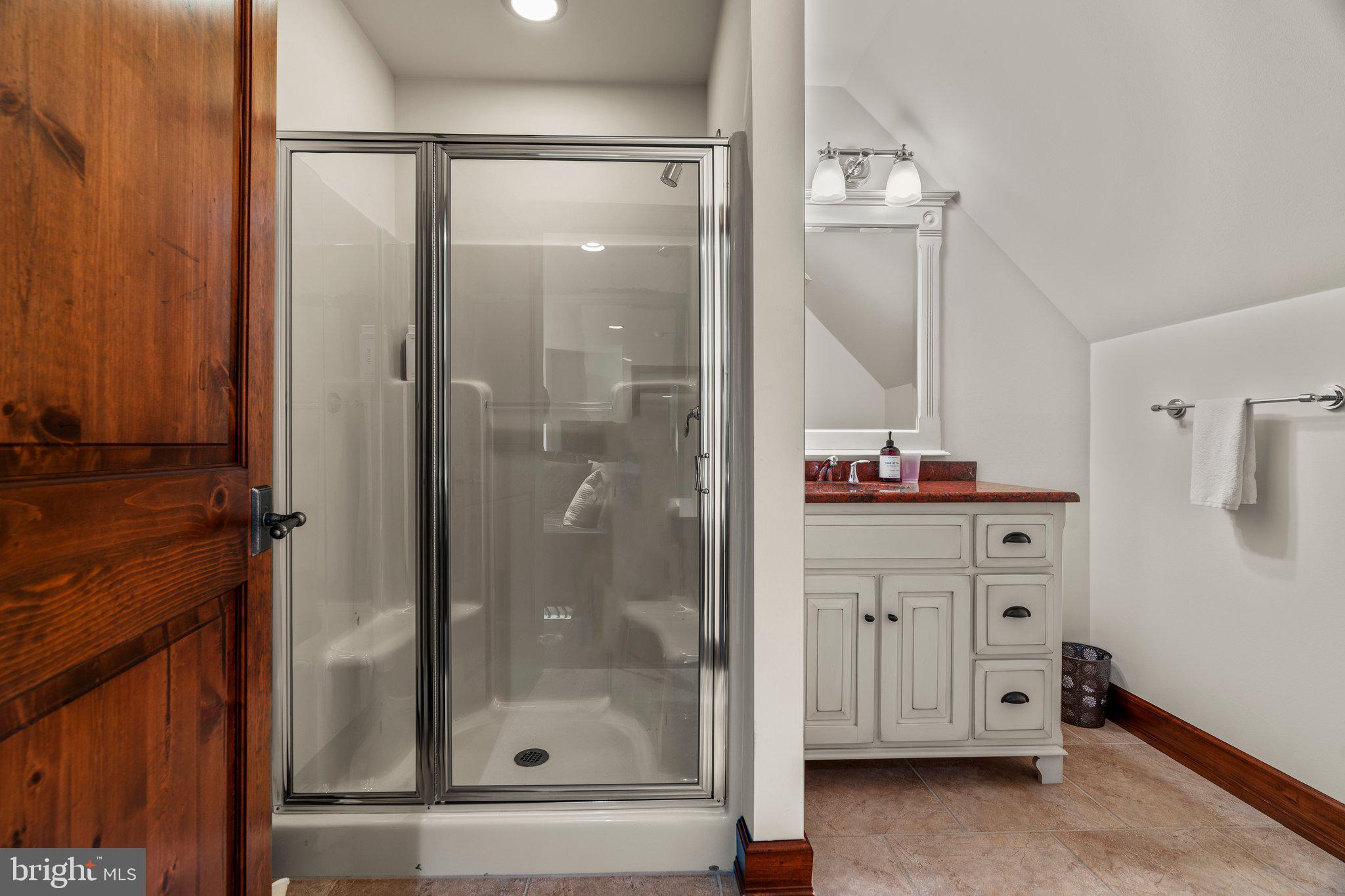 477 Heritage Sewell, NJ 08080 - Photo 37 of 64 a bathroom with a shower sink and mirror