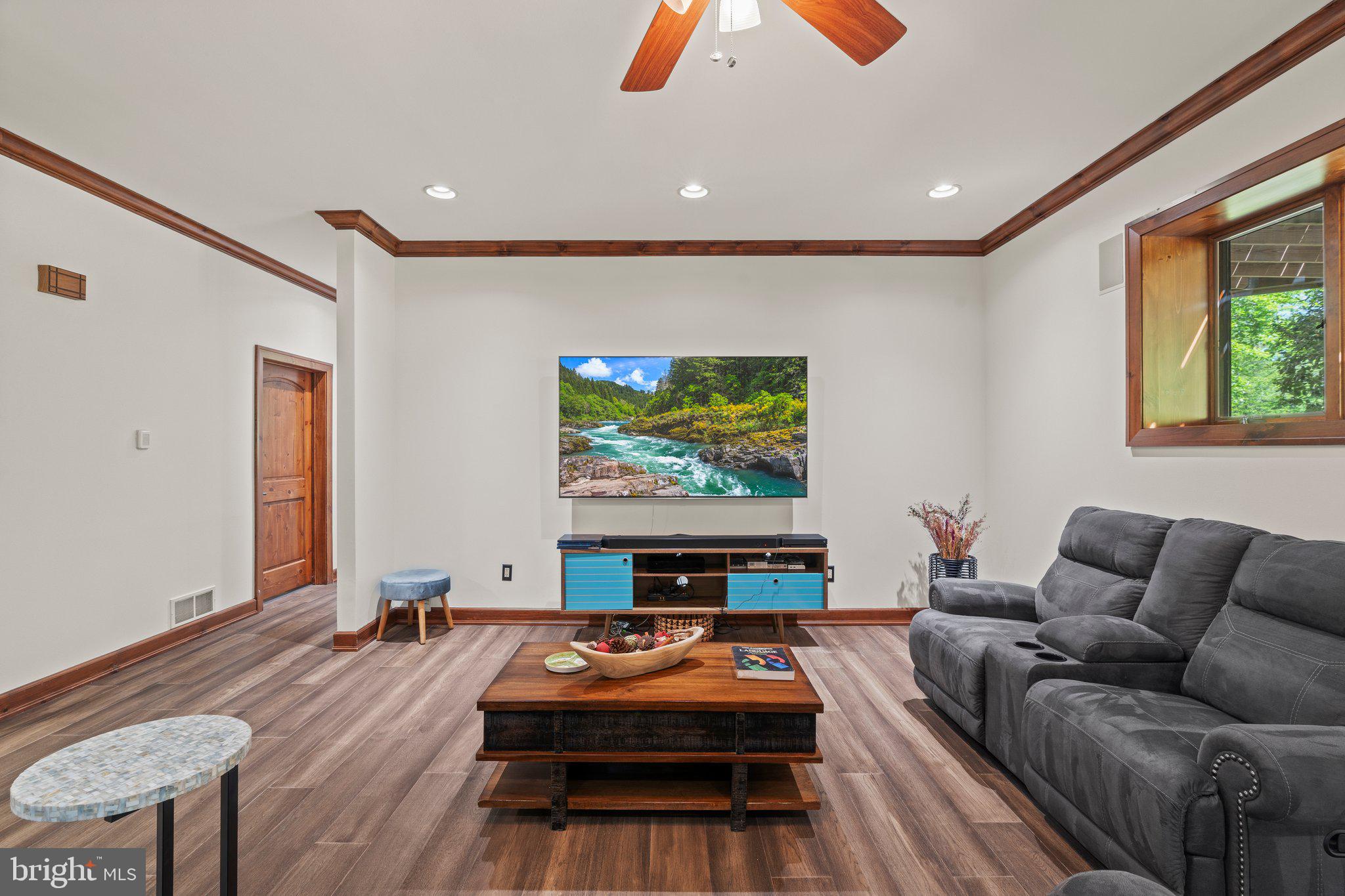 477 Heritage Sewell, NJ 08080 - Photo 39 of 64 a living room with furniture and a flat screen tv